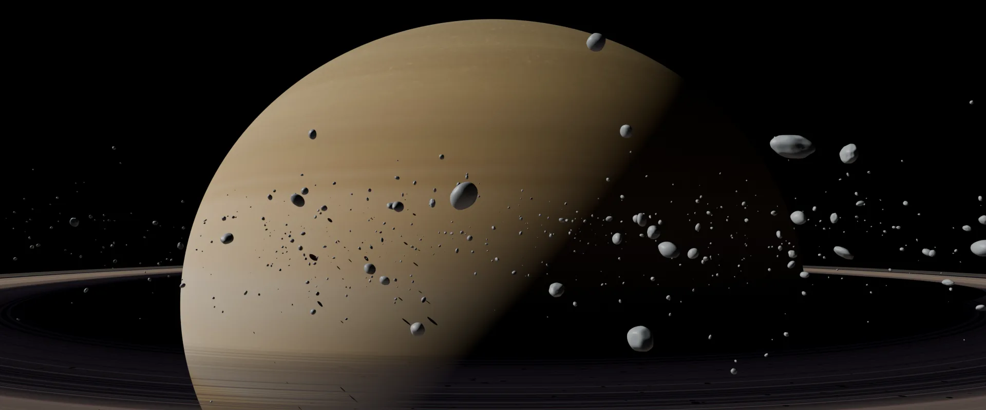 Saturn rising over its rings, with chunks of ring ice drifting in the foreground.